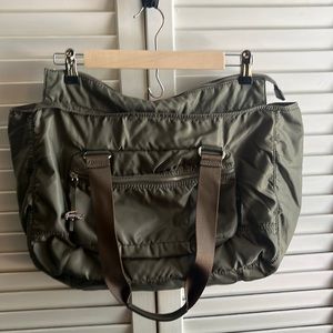 Lacoste olive green nylon purse with leather accents